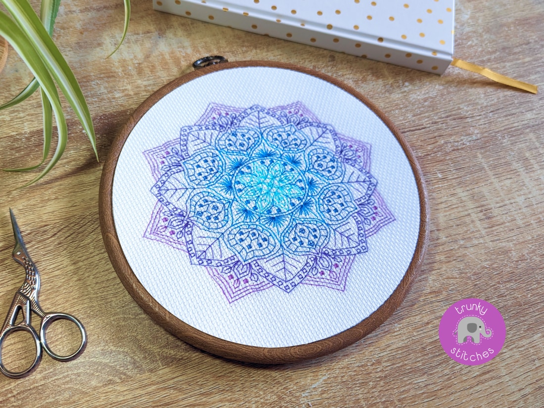 Close up photo of the Purple flower blackwork mandala pattern