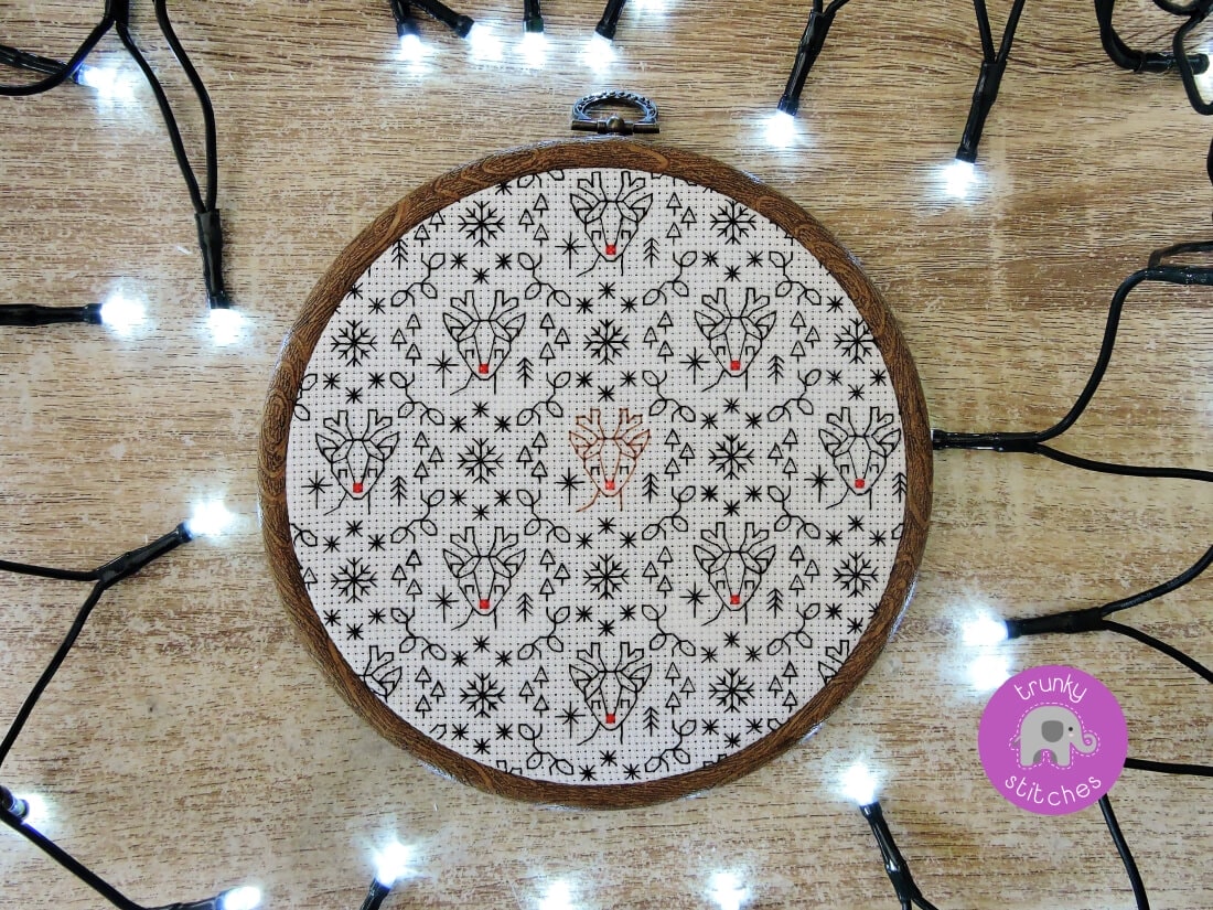 Close up photo of the Rudolph the red nosed reindeer Christmas blackwork pattern